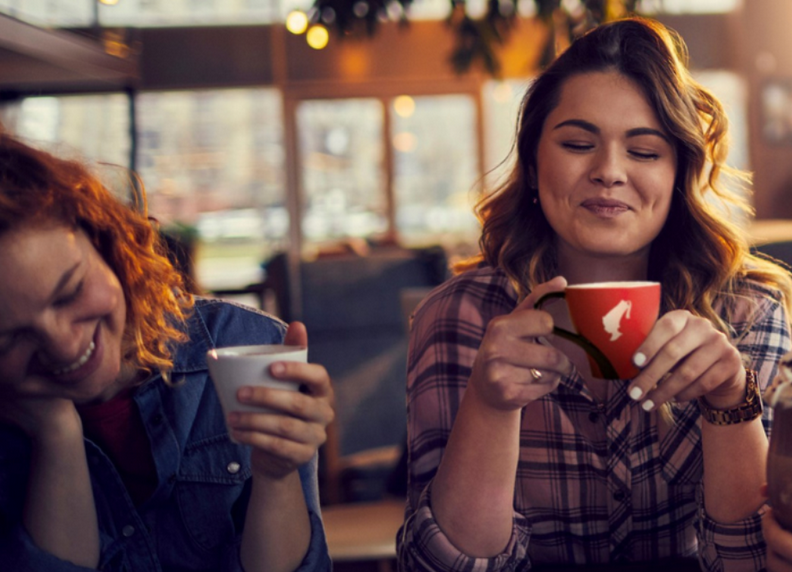 Two beauties drinking Viennese coffee